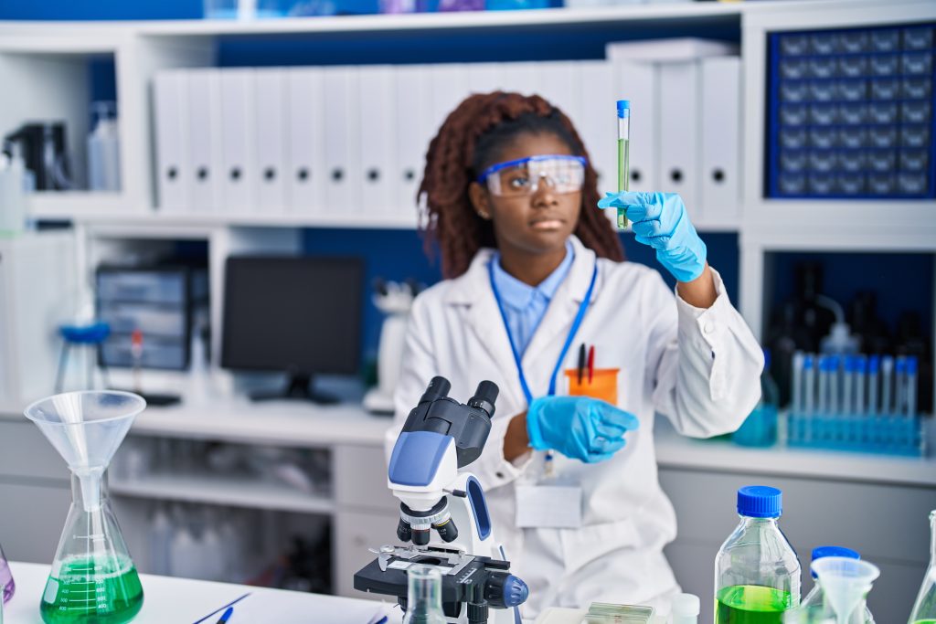 African American Woman Scientist Holding Test Tube Laboratory 1024x683